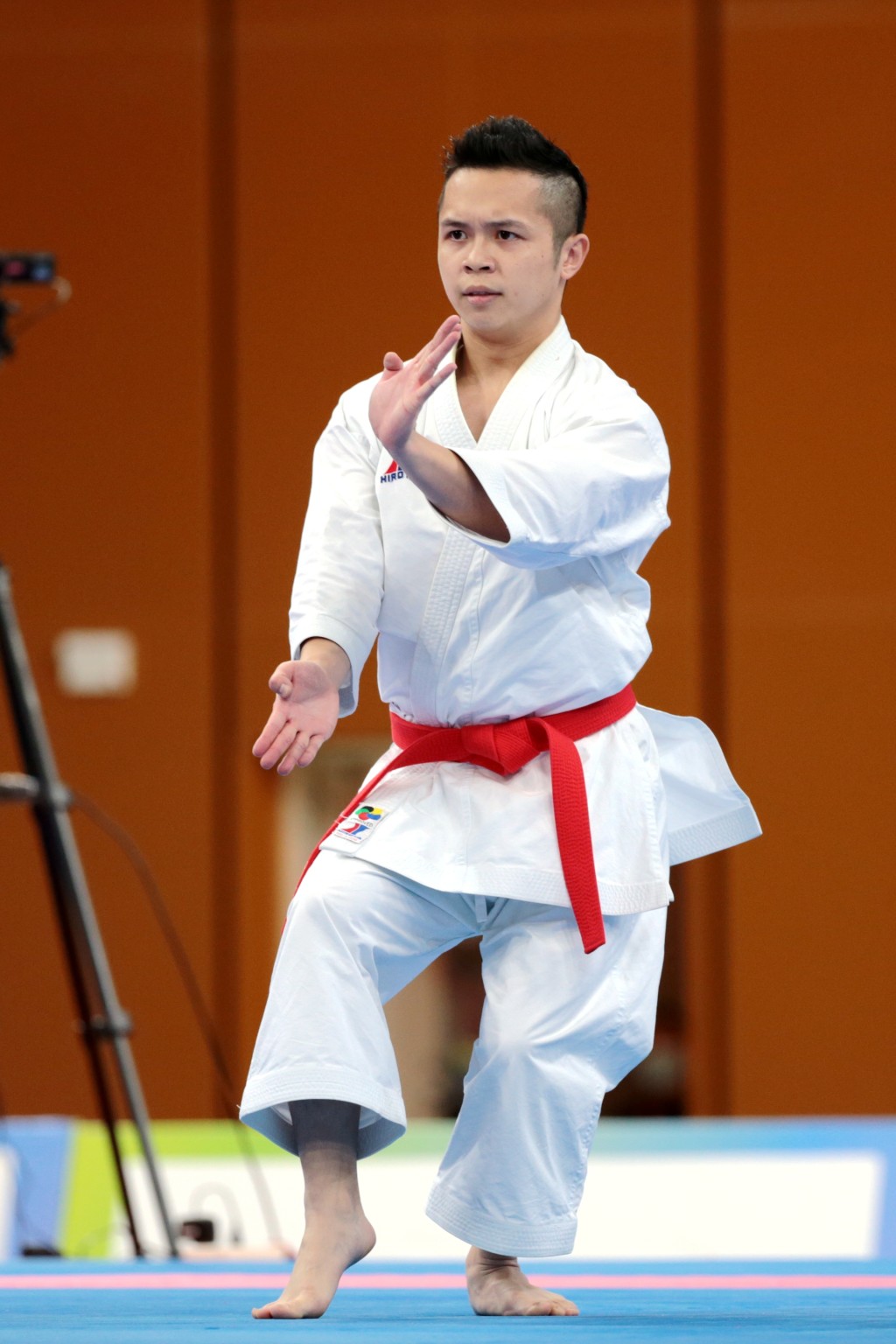 劉知名在全運會空手道男子個人形銅牌戰中, 以套拳「一百O八手」擊敗廣東選手。