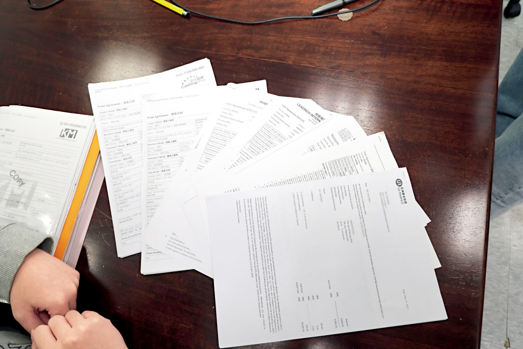 有借據顯示盧X昌涉向阿傑借錢，並由鄭X匡作擔保人。